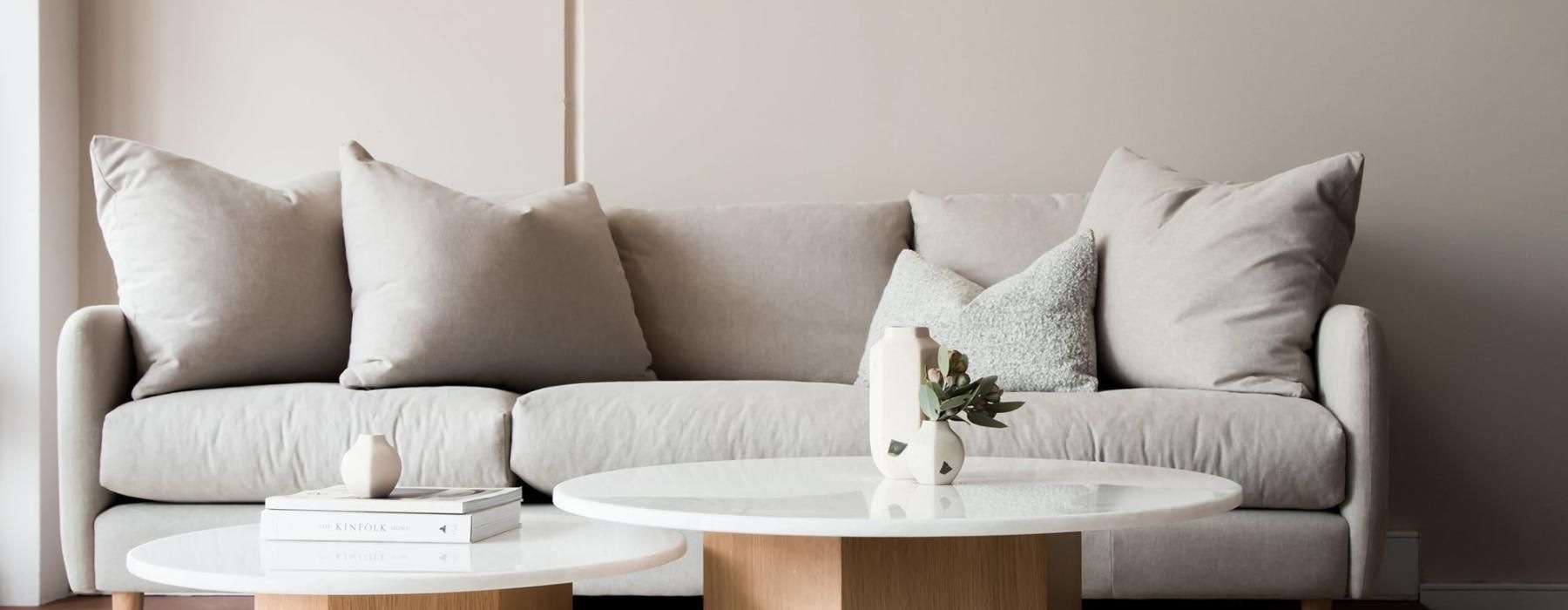 a white couch with a coffee table